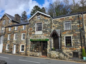 Exterior of Waterloo House, a traditional stone shop building in Beddgelert, Eryri (Snowdonia)